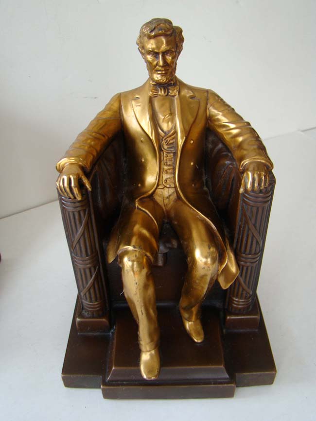 An assembled pair of antique "Lincoln in the chair" bookends by Jennings Brothers circa 1930 — image 4
